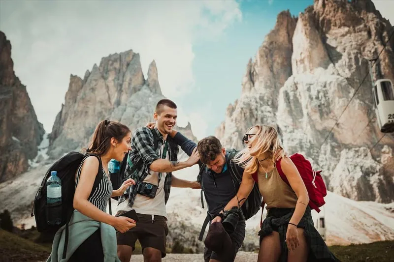 Travellers exploring a mountain landscape
